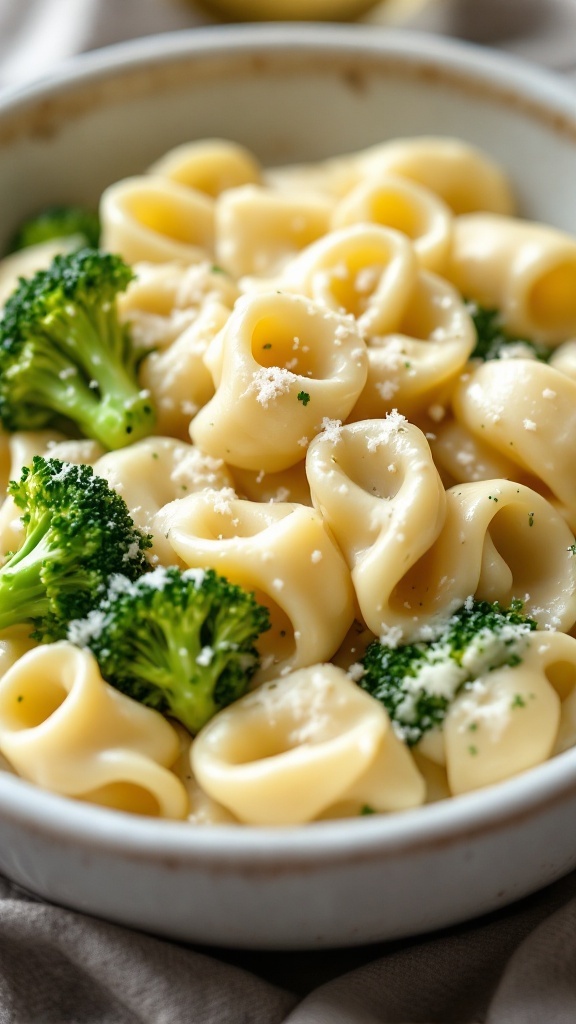 A creamy tortellini dish with broccoli and Parmesan cheese