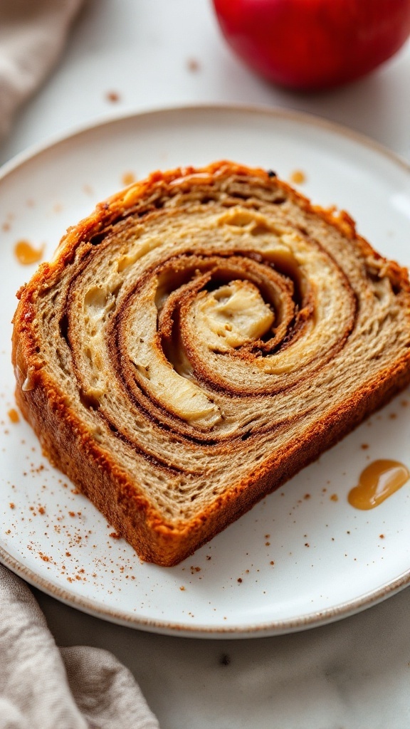 Slice of apple cider cinnamon bread on a plate